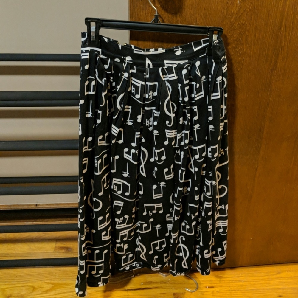 Floats your note midi skirt